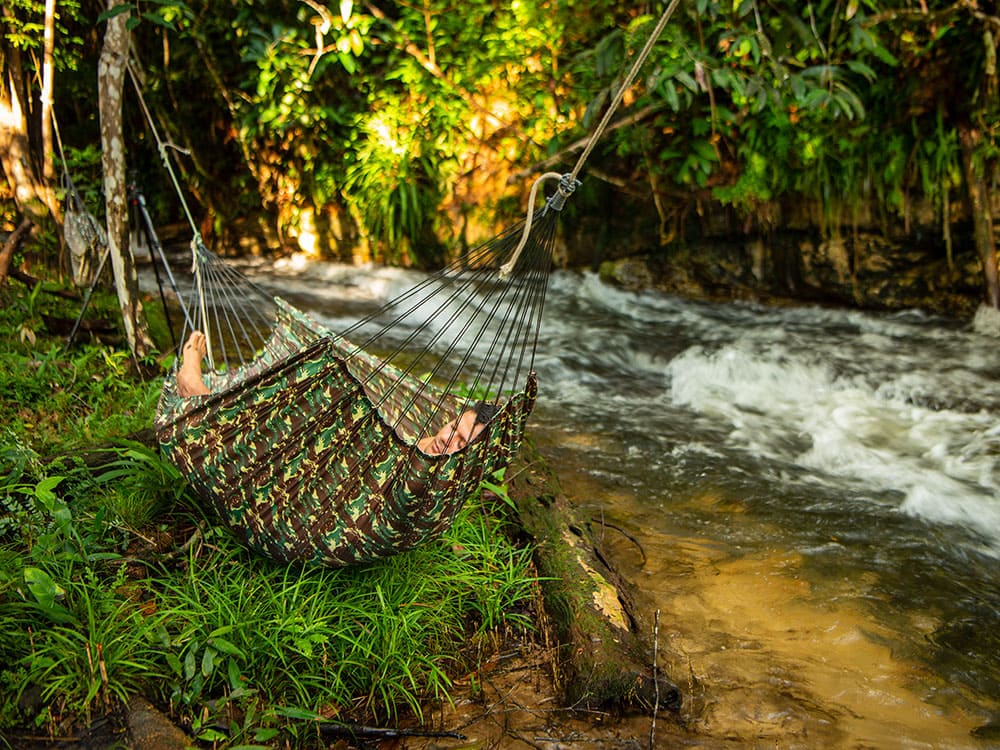 Hammock on the riverbank in the Amazon jungle