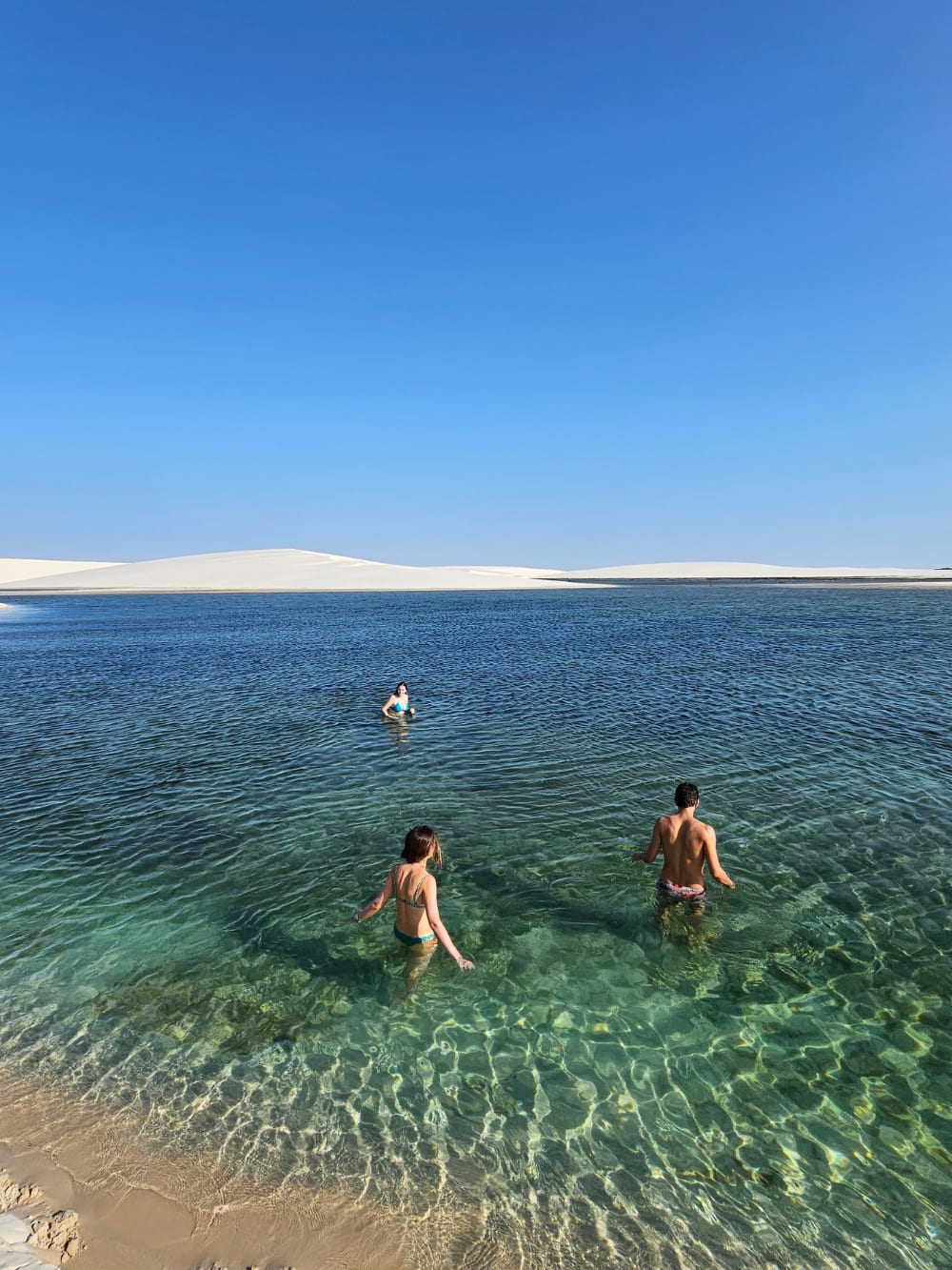 Couple in Lencois Maranhenses lagoon